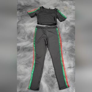 Black pant suit with cropped top green and red stripping